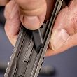 Mata rusznikarska do czyszczenia z zestawem narzędzi - pistolet - Real Avid - AVMCS-P - 19